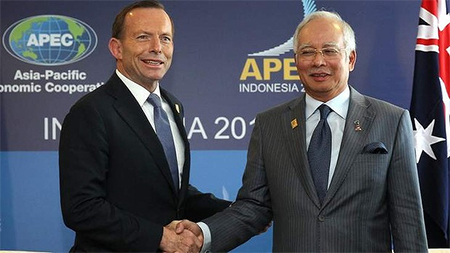 Ausrealian Prime Minister Tony Abbott meets with Malaysian Prime Minister Najib Razak in Bali